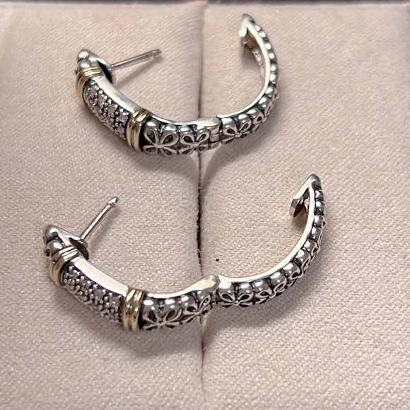 Sparkle in these Sterling Silver & Diamond Hoop Earrings with 14k Gold accents. - Picture 5 of 7